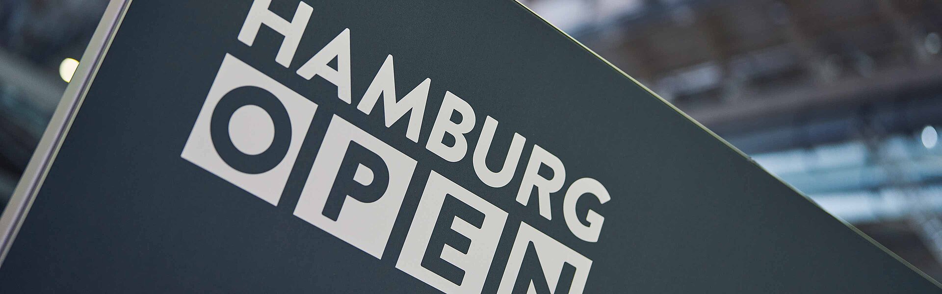 Detail of a sign with the HAMBURG OPEN logo